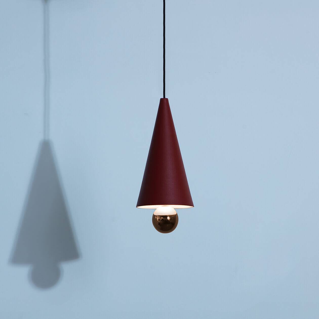 Small-pendant-lamp-Cherry-LED-brown-red-Petite-Friture-turned-on